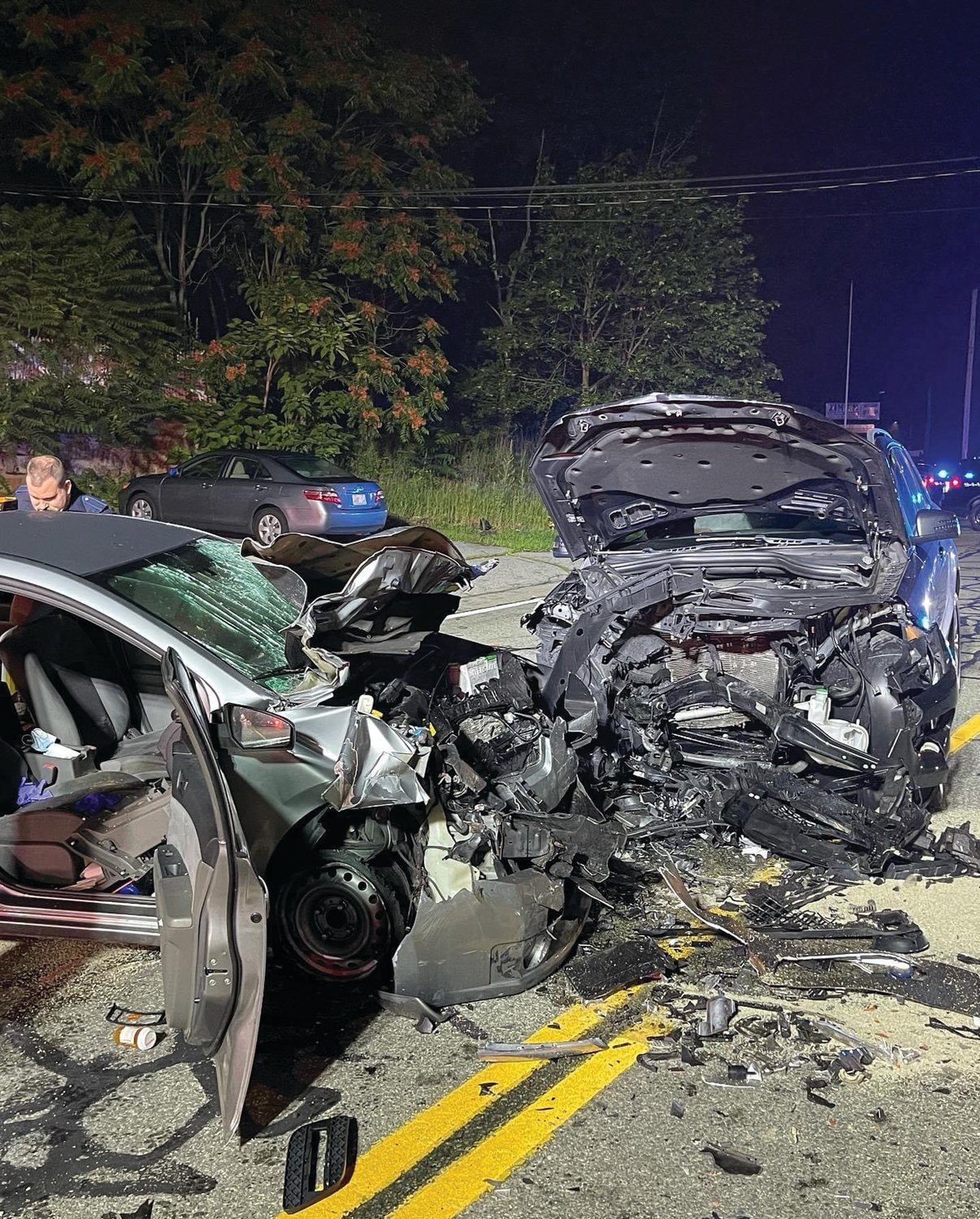 THE AFTERMATH: This image provided by Cranston Police shows the aftermath of a fatal head-on collision that occurred the night of July 8 on Atwood Avenue.